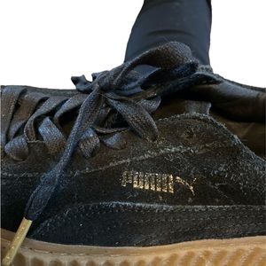 Black suede Puma’s. Women’s size 7.